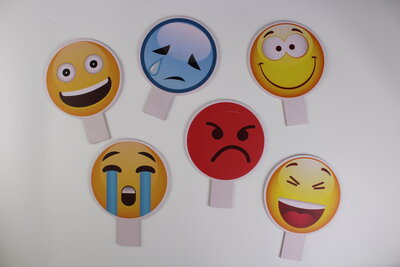 Emoji photo booth props to use at parties