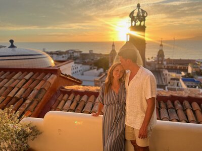 couple in front of sunset