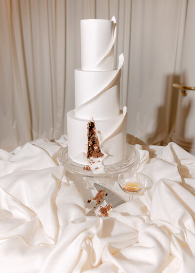 The cake every couple deserves - full of layers and fabric-like details.