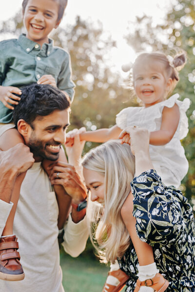 couple with their infant at a portrait photography session