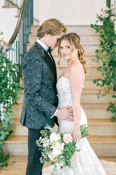 Fort Worth Wedding Photographer | DFW Photographer Rae De Lain Weddings Light and Airy | Groom embraces bride