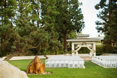 Outdoor wedding ceremony setup at the Turnip Rose Promenade in Costa Mesa