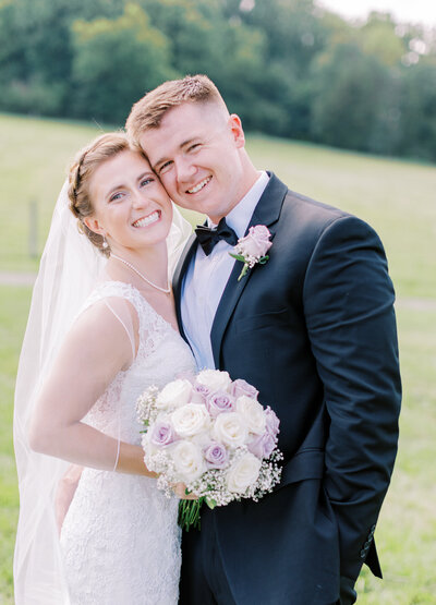 Bride and groom laughing during Northern Virginia wedding.