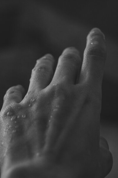Close up black and white shot of a woman's hand