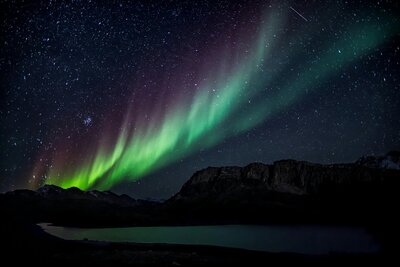 Northern lights sky representing a ketamine medicine session in KAP