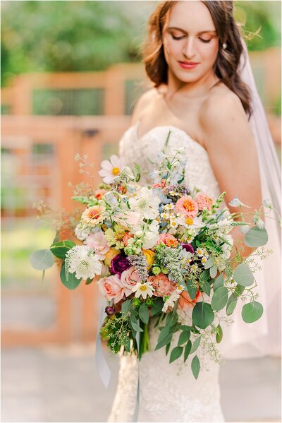 bridal wedding photos with large bouquet by Portland Oregon wedding photography