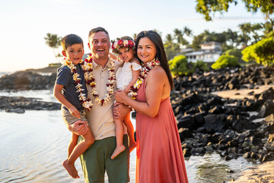 Sunset beach family portrait by a Big Island family photographer