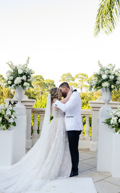 St Augustine old Hollywood style classic wedding photo of a first kiss