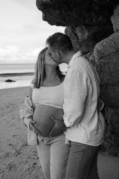 couple kissing on beach