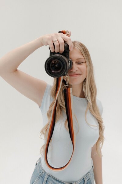 kylie films posing with camera