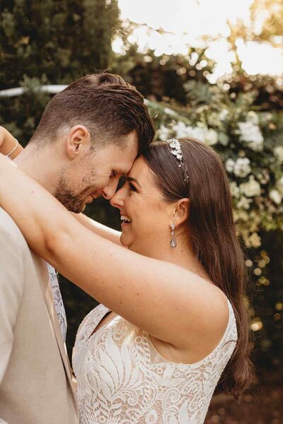 Couple hugging in garden