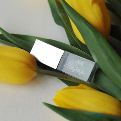 Engraved USB keepsake included in Colorado micro-wedding photography package delivery
