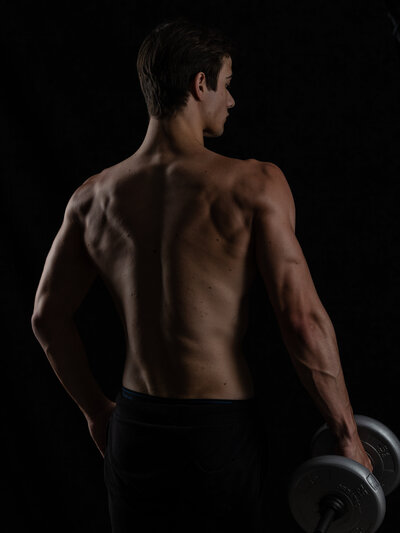 Athletic portrait session showcasing muscles