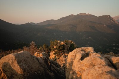 Couple on a mountaintop in Colorado during their wedding day