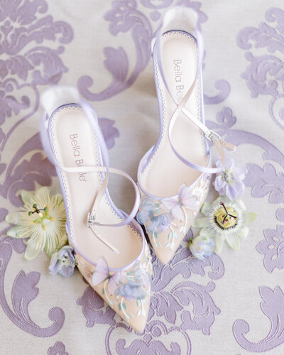 Fine art wedding details captured by Abby Bell Photography, a luxury Alabama wedding photographer, showcasing elegant invitations, rings, and floral accents. Specializing in timeless, personalized wedding photography for couples in Alabama.