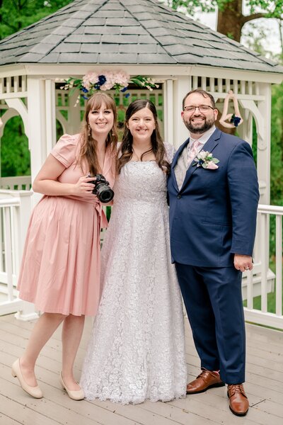 A couple posing with the Catholic wedding photographer Beauty of the Soul Studio