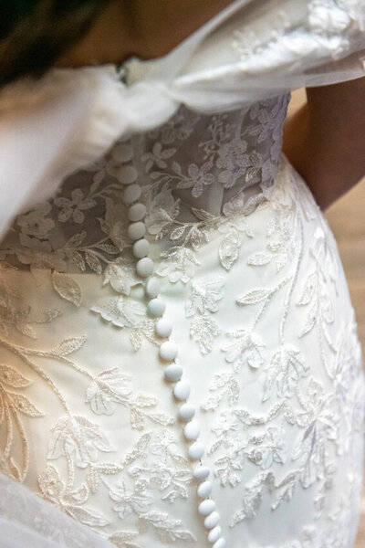 Bridal dress back with cascading buttons