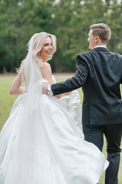 groom kisses brides forehead