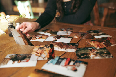 Family photographer looking at photographs in southern Alberta 
