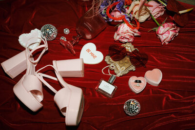 Couple celebrating their Valentine's Day wedding with romantic decor, captured by Vintage Gem Photography.