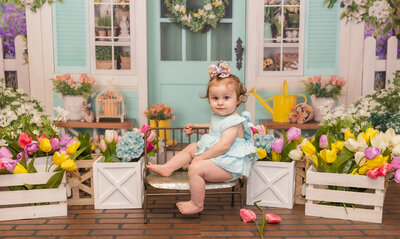 Frozen Moments by Kathy Photography |  indoor spring portrait session for toddler sitting on a bench