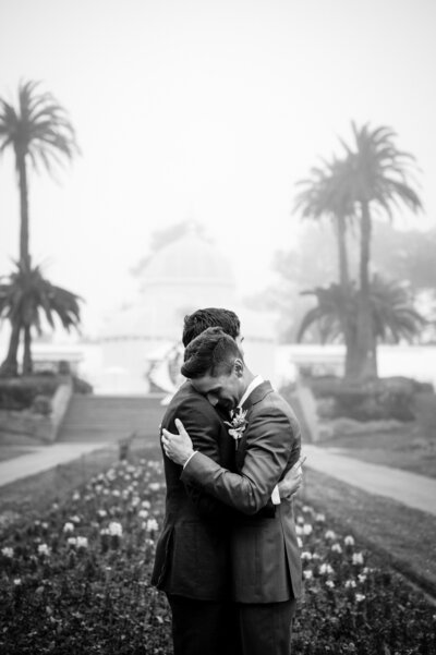 groom and groom walk up memorial steps at their DC wedding