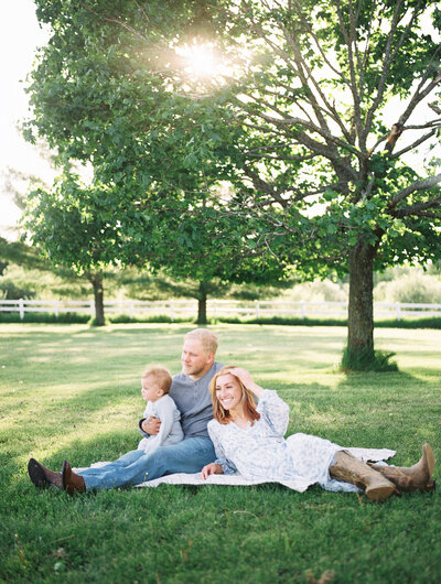 Sunkissed photo taken during an outdoor family session at their family's farm.