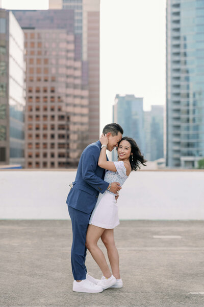 image of a couple hugging at Downtown Austin Rooftop