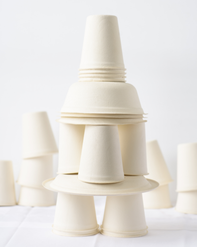 photo of white cups with improper styling, stacked awkwardly