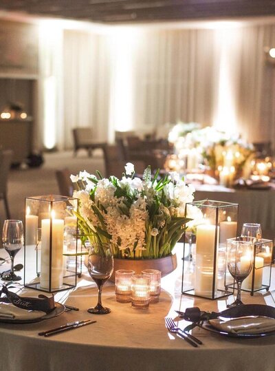 Floral centerpiece on table with candle