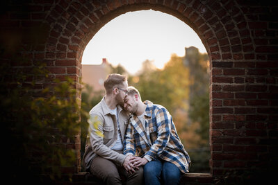 Two men in flannel at their engagement session