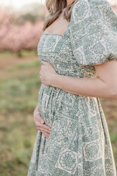 Pregnant woman posing for a portrait - Newborn Photography Greenville SC