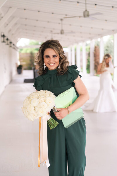 Houston wedding planner Laced with Grace smiling at The Farmhouse in Houston Texas by Swish and Click Photography