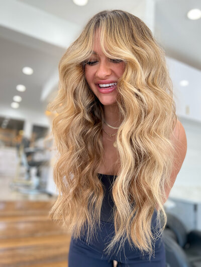 smiling hair extension blonde model