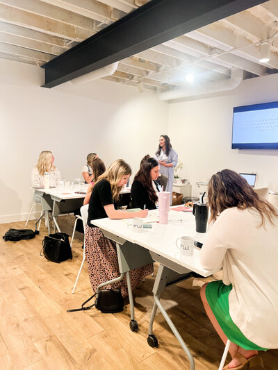 Women listening to women speakers
