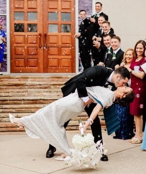 Married couple's deep kiss after wedding ceremony