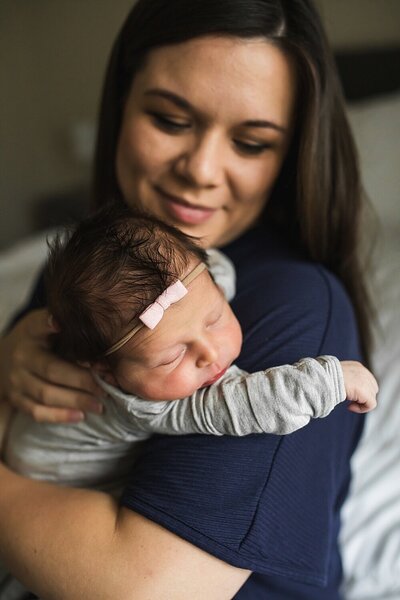 Mother with newborn baby girl in Shoreline, Wa