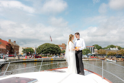 Bride and groom on boat in Annapolis, Maryland