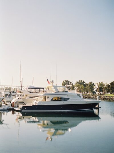 boat in marina at sunset travel print photo