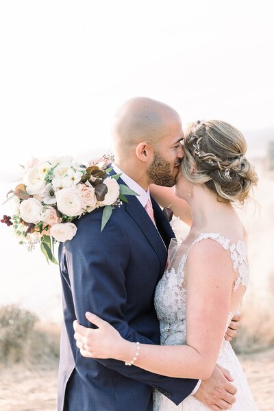Bride and groom walk up memorial steps at their DC wedding