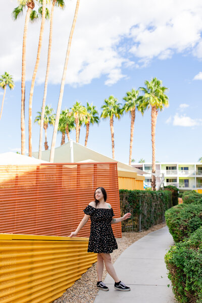 photographer in colorful palm trees