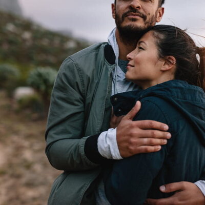 a couple holding each other