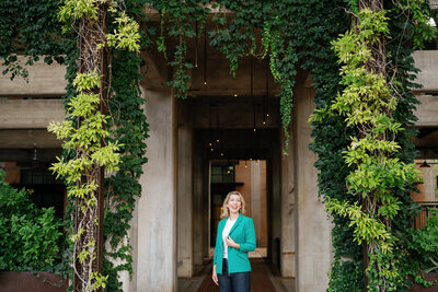 amy lane smiling in a turquoise blazer