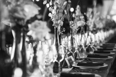 Bride holding up glass of Champagne for a editorial wedding photo.