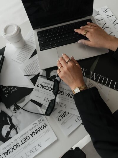 Black and white portrait of a creative working at a table