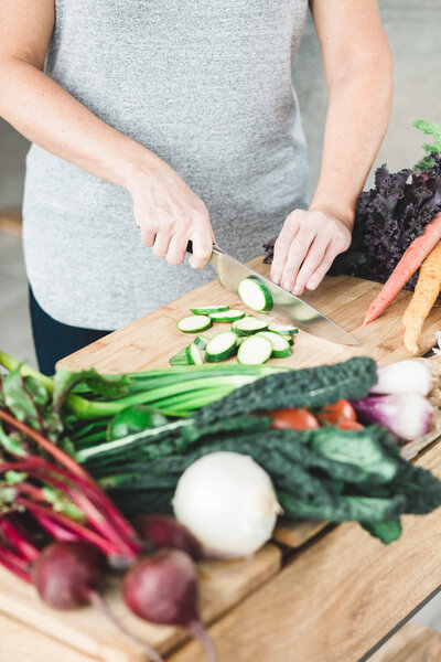 Woman chopping vegetables