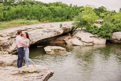 Couple Engagement photo taken at Mckinney  Falls State Park in Austin, Texas.