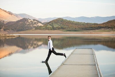 Senior guy standing with his Jeep