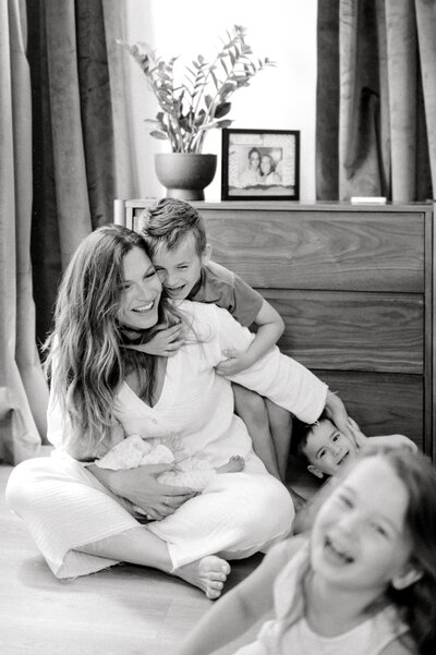 Franklin TN family smiling with toddler girl and newborn baby