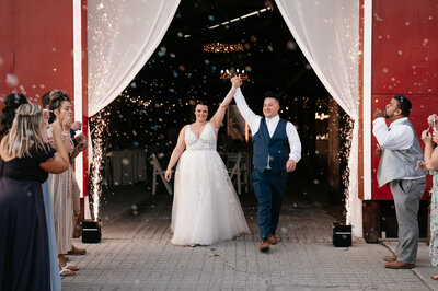 couple grand exit with cold sparklers